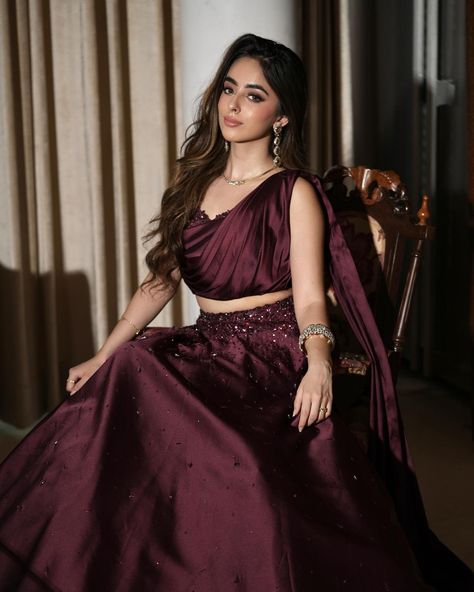 A sight to behold: @saieshagogia10 in our draped wine lehenga set. DM us for outfit details. Wine Lehenga, Satin Lehenga, Lehenga Bridesmaid, Traditional Indian Outfits, Black Jeans Outfit, Wine Colored, Party Wear Sarees, Jean Outfits, Indian Outfits