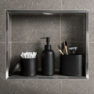 Trendy black washroom accessories redefine modern elegance, offering a sleek and sophisticated touch to bathroom aesthetics. Matte black faucets stand out as striking focal points, their minimalist design and luxurious finish transforming traditional functionality into a contemporary statement. Complementing these fixtures, black soap dispensers, toothbrush holders, and towel bars contribute to a cohesive and stylish look. Black-framed mirrors add depth and sophistication. Matte Black Accessories, Black Bathroom Sets, Men Bathroom, Black Bathroom Accessories Set, Matte Black Bathroom Accessories, Black Room Decor, Monochrome Bathroom, Mens Bathroom, Bathroom Containers