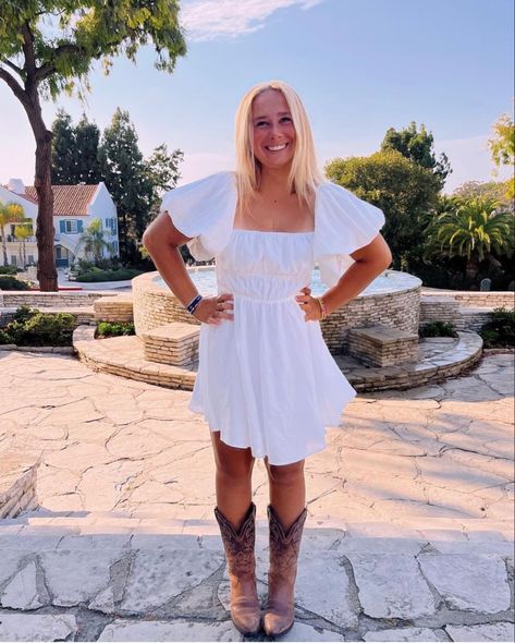 White Romper With Cowboy Boots, White Dress And Boots Country, Dress And Brown Cowboy Boots Outfit, Country White Dress With Boots, Cowboy Boots With White Dress, White Sundress Cowboy Boots, Cowboy Boots And White Dress, Preppy Rodeo Outfits, Sundress And Cowboy Boots Outfit