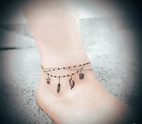 Ankle Bracelets Tattoos For Women, Charm Anklet Tattoo, Bracelet Tattoos For Women, Wrap Around Ankle Tattoos, Anklet Tattoos For Women, Simbols Tattoo, Charm Bracelet Tattoo, Anklet Tattoo, Minimalist Anklet