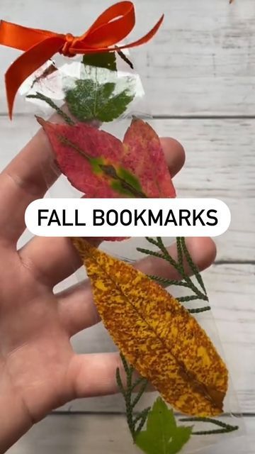 Kidscraftbarn on Instagram: "DIY bookmark for fall 🍁 These are addicting to make! All you need is ⬇️ *packaging tape *leaves/flowers *hole punch *ribbon I made my son a bracelet in another video similar to this a couple weeks back & the color of the leaves are still the same 🥰 Save for later or share with a friend! 💚 #fall #seasons #nature #crafts #easy #diy #bookmarks" Fall Crafts Leaves, 5th Grade Fall Art Projects, Fall Crafts For Kids Elementary, Easy Autumn Crafts, Easy Diy Bookmarks, Leaf Crafts Kids, Fall Leaf Crafts, Laminating Crafts, Easy Bookmarks