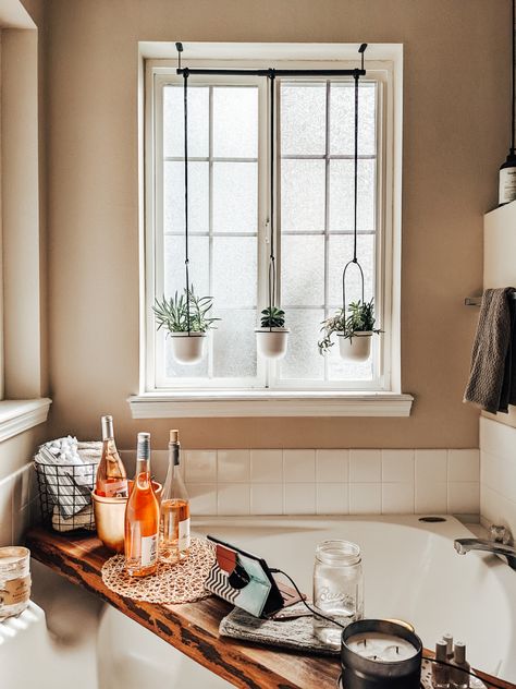 Bathtub Tray Decor Bathroom Ideas, Bathroom Window Decor Over Tub, Built In Bathtub Decor, Tub Window Decor, How To Style A Bathtub, Bathroom Window Curtains Over Tub Master Bath, Window Above Toilet Decor, Hanging Plants Over Bathtub, Garden Tub Decor Master Bath Bathroom