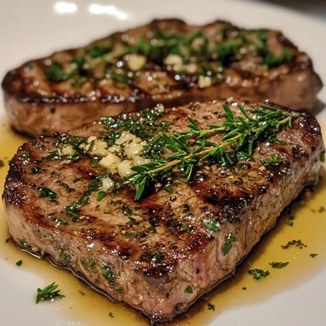 🥩🧈 Juicy and flavorful! Try our Herb-Butter Steak for a delicious meal! 🥩✨ #SteakLovers #FlavorfulMeals Herb-Butter Steak Ingredients: Ribeye steak (2, about 1 inch thick) Butter (4 tbsp, softened) Fresh rosemary (1 tbsp, chopped) Fresh thyme (1 tbsp, chopped) Garlic (2 cloves, minced) Olive oil (2 tbsp) Salt (to taste) Black pepper (to taste) Instructions: Preheat a skillet over medium-high heat and add olive oil. Season steaks with salt and pepper. Cook steaks for 3-4 minutes per side f... Good Dishes, Food Lover Aesthetic, Steak Aesthetic, Seasoned Steak, Rosemary Steak, Beef Steak Recipes, Butter Steak, Dream Food, Chinese Cooking Recipes