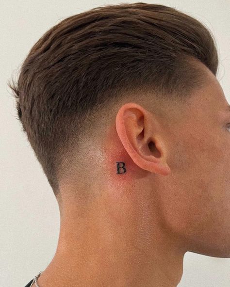 Letter tattoo behind ear / font Initials Tattoo Behind Ear, R Tattoo Behind Ear, Letter Ear Tattoo, Small Initial Tattoo Behind Ear, Neck Initial Tattoo, Small Letter Tattoo Behind Ear, Behind The Ear Letter Tattoo, The Letter B Tattoo, Small B Tattoo Letter