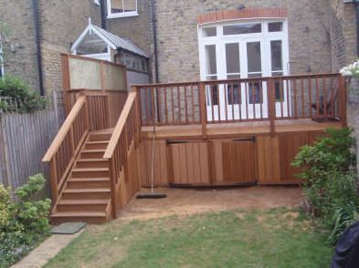 Deck With Storage Underneath, Raised Decking, Under Deck Storage, Decking Ideas, Wood Shed Plans, Raised Deck, Raised Patio, Deck Storage, Decking Area