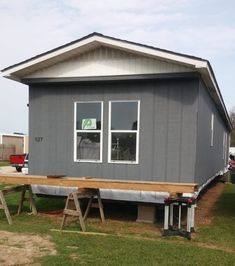 Modern Single Wide Mobile Homes, Trailer Colors Exterior, Decorating Mobile Homes Single Wide, Mobile Home Lighting Ideas, Singlewide Trailer Remodel, Single Wide Kitchen Ideas, Mobile Home Cottage, Small Home Renovation Ideas, Mobile Home Exterior Makeover