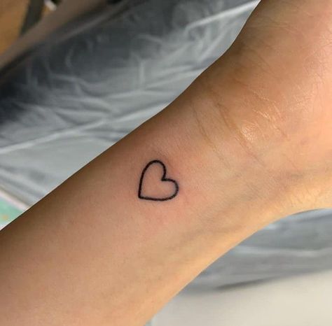 Simple Heart Tattoos For Women, Small Heart Wrist Tattoos For Women, Small Heart Outline Tattoo, Heart Finger Tattoo For Women, Wrist Tattoos Heart, Heart Tattoo Small Wrist, Outline Heart Tattoo, Heart Tattoo Simple, Small Heart Wrist Tattoo