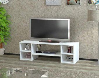 Simple Tv Stand, Tv Stand Decor Living Room, Tv Stand On Wheels, L Shaped Shelves, Tv Showcase, Simple Tv, Tv Unit Furniture Design, Tv Consoles, Room Tv Unit