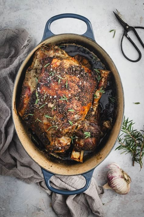 This super easy and delicious Dutch oven leg of lamb recipe is full of fresh garlic and rosemary. A roast night classic dinner! Leg Of Lamb Roast Boneless Dutch Oven, Dutch Oven Leg Of Lamb, Boneless Leg Of Lamb Recipes Dutch Oven, Oven Roasted Leg Of Lamb Bone In, Irish Lamb Recipes, Dutch Oven Lamb Roast, Roasted Lamb Leg Boneless, Lamp Leg Recipe, Leg Of Lamb Recipes Bone In Slow Cooker