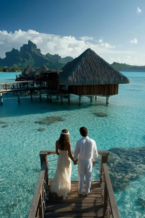 Treat yourselves to the ultimate honeymoon in Bora Bora. Stay in an overwater bungalow, snorkel hand-in-hand in crystal-clear waters, and enjoy intimate beachside dinners with your special someone. 🏝️💍🌊 #BoraBoraHoneymoon #CouplesRetreat #IslandParadise Honey Moon Bora Bora, Bora Bora At Night, Honey Moon Locations, Honeymoon Bora Bora, Honeymoon In Bora Bora, Dream Honeymoon Destinations, Honey Moons, Honeymoon Tropical, Us Honeymoon Destinations