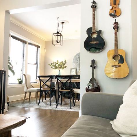 35 Simple Guitar Wall Display Ideas For Music Lovers | HomeMydesign | HomeMydesign Guitars On Wall, Wall Dining Room Decor, Space Blueprint, Guitars On The Wall, Wall Dining Room, Home Music Rooms, Guitar Room, Dining Room Remodel, Music Room Decor