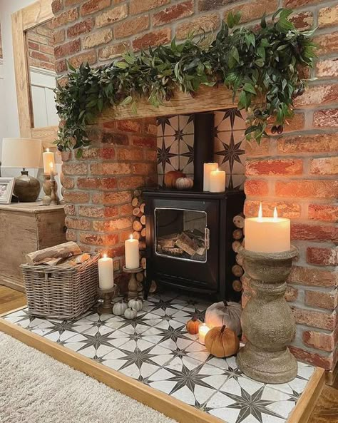 Living Room Logburner, Christmas Log Burner Fireplace, Log Burner Christmas Decorations, Birch Logs In Fireplace, Tv On Wall Next To Fireplace, Decorative Logs In Fireplace, Cozy Cottage Style Living Room, Fireplace Logs Decorative, Brick Hearth Ideas