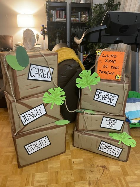 Outdoor Jungle Decorations, Jungle Student Section Theme, Cargo Boxes Safari, Safari Diy Decor, Safari Boxes Jungle Theme, Disney Jungle Cruise Decor, Safari Crates Jungle Theme, Safari Themed Birthday Party Decoration Decorating Ideas, Safari Hallway Decorations