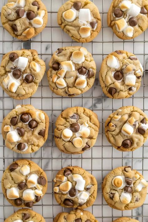 These marshmallow chocolate chip cookies are a fun twist on a childhood classic! Soft, chewy, studded with chocolate chips, and loaded with gooey marshmallows, they're just waiting for you to take a bite. Chocolate Chip With Marshmallow Cookies, Chocolate Chip Cookies Marshmallow, Chocolate Chip Cookie With Marshmallow, Chocolate Chip Cookies With Marshmallows Recipe, Cookie Recipes Marshmallow, Chocolate And Marshmallow Cookies, Snickerdoodle Marshmallow Cookies, Marshmallow Cookies Easy, Marshmellow Treats Christmas