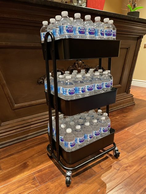 14 Efficient Bottled Water Storage Ideas for Small Spaces - Addicted To Organization Drink Storage Ideas Garage, Diy Drink Storage Ideas, Extra Drink Storage Ideas, Bottle Water Storage Ideas, How To Organize Water Bottles, Bottled Water Storage Ideas, Water Bottle Organization Ideas, Bottled Water Storage, Drink Storage Ideas