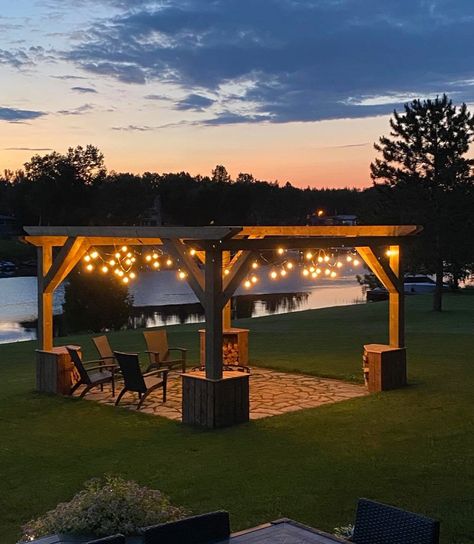 Fire Pit Ideas Backyard Square Area, Fire Pit With Posts And Lights, Fire Pits With String Lights, Outdoor Fire Pit With Pergola, Fire Pit With Arbor, Backyard Fire Pit Square, Fire Pit With Gazebo, Pergola Ideas Fire Pit, Outdoor Bar And Fire Pit