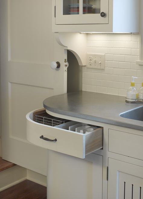 In this kitchen, a curved drawer and base cabinet maximizes storage while easing out of the traffic flow between a back stairway and the kitchen sink. Curved Kitchen Cabinets, Curved Drawer, Corner Drawers, Curved Cabinets, Curved Kitchen, Modular Kitchen Cabinets, Kitchen Base Cabinets, Kitchen Remodel Before And After, Diy Kitchen Storage