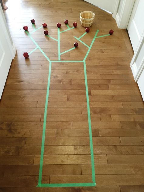 painters tape apple tree picking activity that's great for gross motor skills Sport Art Activities, Tree Activities, Balance Game, Gross Motor Activity, Apple Unit, Apple Activities, Giving Tree, The Giving Tree, Baby Parenting