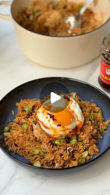 John Gregory-Smith on Instagram: "Garlicy Soy Chicken Rice – Recipe below – This super simple one pot baked chicken rice is one of those effortless meals that tastes insanely good. You cook everything together for 20 minutes and the top it off with a fried egg. This is defo something you could bung in a slow cooker if you have one. Let me know what you guys think x JGS     Serves 2     300g Basmati rice   450ml boiling water   1 chicken stock cube   2 tbsp rice wine   2 tbsp oyster sauce   1 tbsp dark soy sauce   1 tbsp sriracha   2 tsp light soy sauce   2 tsp sesame oil   2 cloves garlic grated  4 chicken thigh fillets   4 spring onions, finely chopped   Chilli oil to serve   2 fried eggs (optional)     1.	Chuck the rice into a saucepan. Whisk the water together with the stock cube and th Garlic Soy Chicken Rice, Baked Chicken Rice, Chicken Thigh Fillets, Soy Garlic Chicken, Gregory Smith, Recipes With Soy Sauce, Chicken Rice Recipes, Dark Soy Sauce, Soy Chicken