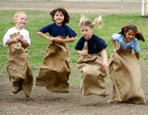 POTATO SACK RACE, CARNIVAL GAMES RENTALS - Austin, San Antonio, Texas Potato Sack Races, Tractor Birthday Party, Sack Race, Tractor Party, Potato Sack, Festival Ideas, Relay Races, Highland Games, Relay For Life