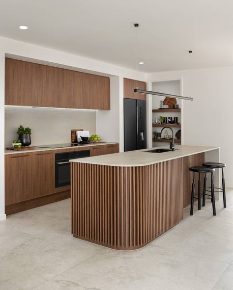 walnut kitchen with curved island in vertical panelling Stone Ambassador, Tv Bookcase, Sanctuary House, Curved Kitchen Island, Curved Kitchen, Coastal Kitchen Design, Interior Design Programs, Walnut Kitchen, Coastal Kitchen