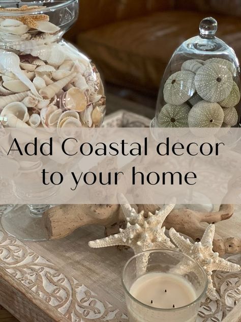 Coastal Coffee Table Decor, Coastal Mantle Decor, Beach Fireplace, Brown Leather Chesterfield Sofa, Round Coffee Table Decor, Coastal Coffee Table, Front Porch Decorating Ideas, Beach Centerpieces, Coffee Table Vignettes