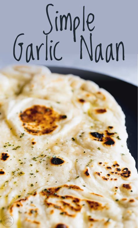 Learn how to make delicious, easy homemade Indian flatbreads with this Simple Garlic Naan Recipe. The quick breads are made using a yeast dough, that doesn't need baking as it cooks on the stovetop in a skillet or griddle. Perfect for serving with your curries, especially when drizzled with butter and garlic, or leave the butter off if you are serving vegans. Naan Bread Recipe Easy, Homemade Garlic Naan, Indian Flatbreads, Garlic Naan Recipe, Homemade Naan Bread, Homemade Bread Recipe, Recipes With Naan Bread, Yeast Dough, Garlic Naan