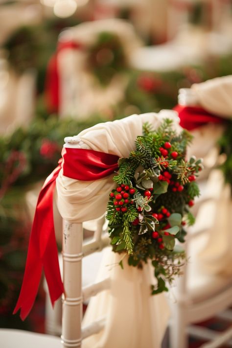 Add a sprinkle of festive magic to your big day 🌿✨ with miniature wreaths on chair covers. Berries and lush greenery create a whimsical vibe for guests. Perfect for winter nuptials or a nature-inspired theme! 🌸🍃 #WeddingInspiration #ChairDecor #WeddingDetails #FestiveTouch #MiniWreaths #WeddingGreenery #DIYWedding #CharmingWeddings Christmas Arch Wedding, Wedding Christmas Ideas, Christmas Wedding Chair Decorations, Christmas Wedding Decorations Receptions, Wedding Chair Cover Ideas, Christmas Church Wedding, Christmas Wedding Colors, Christmas Wedding Reception, Christmas Theme Wedding