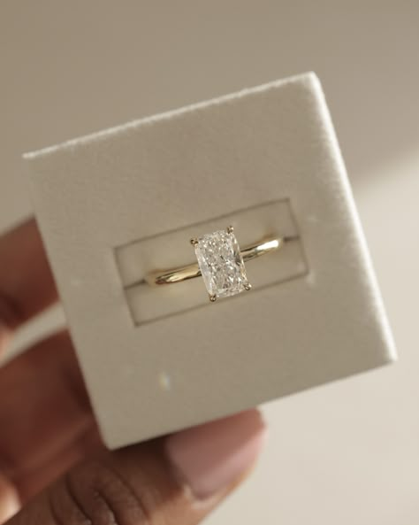 Crushing on this elongated cushion solitaire...🤍⁠ ⁠ The elongated cushion cut is all about elegance, with its unique flair of rounded corners resembling a pillow.   The perfect blend of timelessness and statement✨⁠ ⁠  Details: Ava Elongated Cushion Solitaire Low set 1.54cts | F | VS1 Elongated Princess Cut Engagement Ring, Elongated Cushion Carat Comparison, Square Diamond Gold Band Engagement Ring, Unique Engagement Rings Rectangle, Elongated Cushion Engagement Ring Thick Band, Rectangle Cushion Engagement Ring, Enlogated Cushion Ring, Elongated Cushion Vs Radiant, Square Cut Engagement Ring