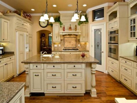 15 White Antique Kitchen Designs That Abound With Warmth & Charm Cream Colored Kitchen Cabinets, French Country Kitchen Cabinets, Classic Kitchen Cabinets, French Country Kitchen Designs, Cream Kitchen Cabinets, Antique White Kitchen Cabinets, Antique Kitchen Cabinets, Antique White Cabinets, Antique White Kitchen