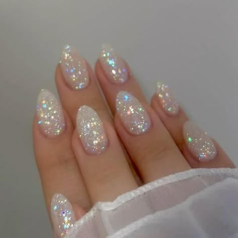 Sparkle Wedding Nails For Bride, Rounded Glitter Nails, Sparkly Party Nails, Milky White Sparkly Nails Acrylic, Cute Nail Ideas For Prom, Pearl Sparkle Nails, Classy Glam Nails, White Sparkle Gel Nails, Clear Glitter Dip Nails