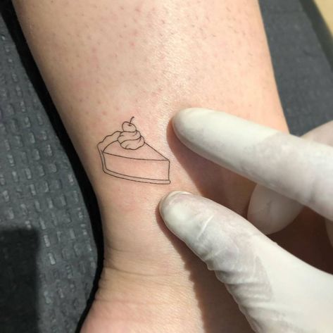 Pumpkin Pie Tattoo Ideas, Small Pie Tattoo, Piece Of Pie Tattoo, Key Lime Pie Tattoo, American Pie Tattoos, Tiny Cake Tattoo, Slice Of Pie Tattoo, Small Cake Tattoo, Food Related Tattoos