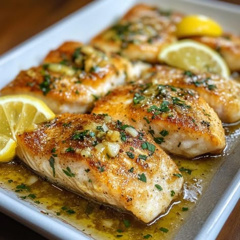 Perfectly Baked Lemon Garlic Butter Fish Lemon Garlic Fish Marinade, Half Baked Harvest Fish Recipes, Baked Lemon Fish Recipes, Buttery Fish Recipes, Lemon Picatta Fish, Lemon Garlic Butter Fish Recipes, Lemon Butter Mahi Mahi, Lemon Butter Garlic Fish, Lemon Garlic Cod Recipes