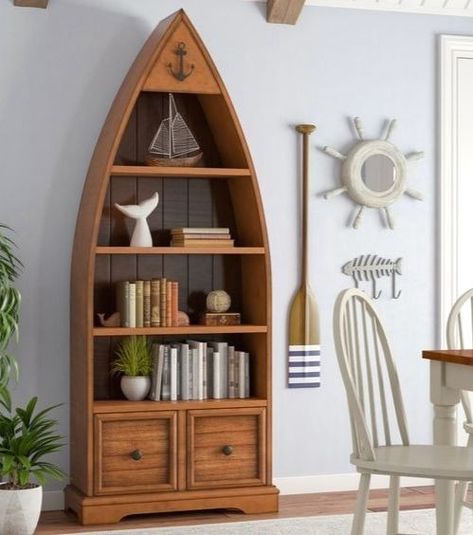 A boat shelf for the nautical beach cottage.... featured on completely-coastal.com #cottagestyle #shelves Nautical Shelves, Boat Bookcase, Boat Shelf, Coastal Flooring, Floor Shelf, Coastal Bedrooms, Beach Cottage Decor, Beach Cottage Style, Coastal Furniture