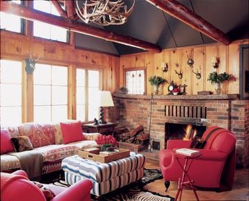 Rustic Mountain Cabin - ELLE DECOR Northwoods Decor, Pine Paneling, Interior Fireplace, Woods Cabin, Brick Floors, Red Living Room, Red Living, Minimalist Garden, Lake Cabin