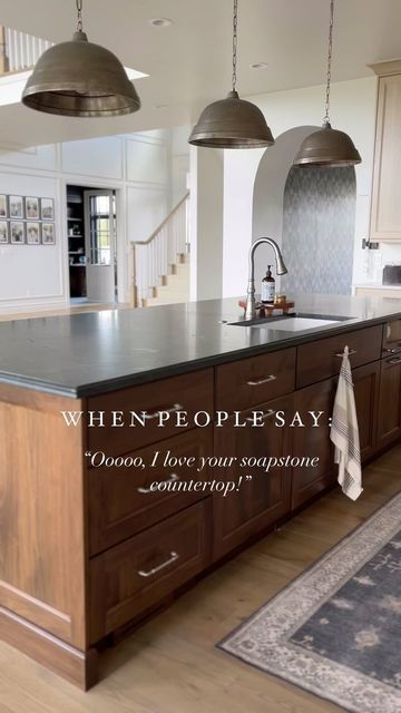 Dark Wood Cabinets With Black Countertop, Soapstone Granite Countertop, Black Diamond Quartzite Honed, Black Island Brown Cabinets, Black Diamond Quartzite Kitchen, Double Ogee Edge Countertops, Honed Soapstone Countertops, Kitchen Island Black Countertops, Soapstone Looking Quartz