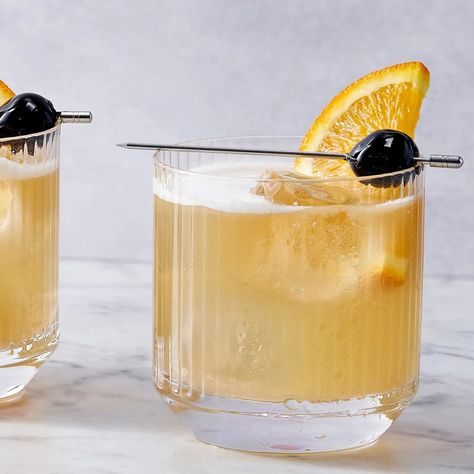 Whiskey Sour Recipe | Bon Appétit Whisky Sour Recipe, Whiskey Sour Recipe, Whisky Sour, Sour Foods, Lemon Twist, Orange Wedges, Sour Cocktail, Good Whiskey, Bourbon Cocktails