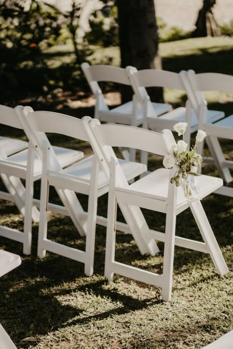 Classic White folding ceremony chairs White Chairs Wedding, Wedding Outline, Jordans Wedding, Ojai Valley Inn And Spa, Tennis Wedding, Farmhouse Inn, Wedding Ceremony Chairs, Modern And Rustic Decor, White Folding Chairs