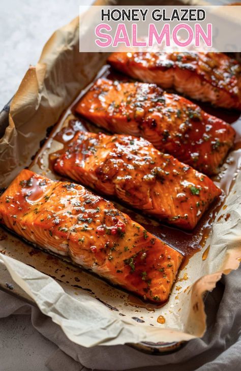 Get restaurant-quality honey glazed salmon at home! This recipe delivers tender, flavorful fish every time Yummy Dinner Recipes Healthy, Salmon Glaze Recipes Honey, Honey Glaze Salmon Recipes, Oven Baked Honey Garlic Salmon, Honey Glaze For Salmon, Best Oven Salmon Recipe, Sweet Salmon Glaze, Sweet Glazed Salmon, Baked Glazed Salmon