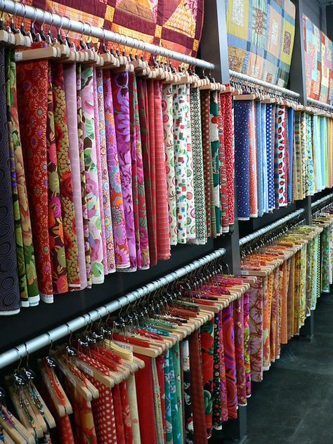 Fabric Shop Interior, Showroom Display Ideas, Fabric Shop Display, Fabric Showroom, Fashion Store Design, Chudi Neck Designs, Furniture Ideas Bedroom, Fabric Organization, Fabric Store Displays