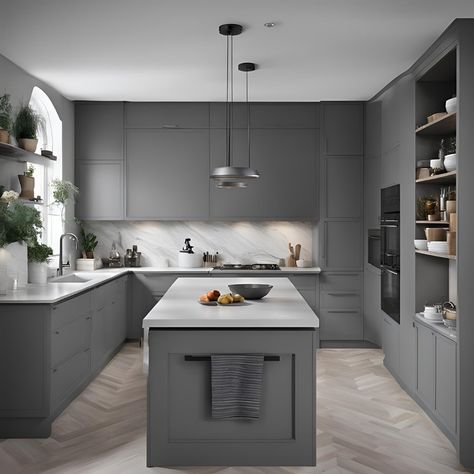 Gray Scale Goals This kitchen is a study in sophisticated style, with sleek gray cabinets and marble countertops. The large island provides plenty of prep space and seating, making it perfect for entertaining. Would you go gray in your kitchen? #graykitchen #kitchendecor