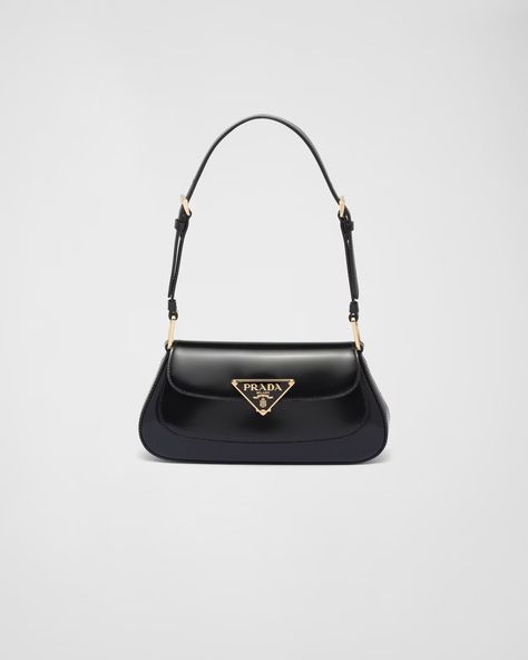 Prada Brushed Leather Shoulder Bag, Black Prada Bag Aesthetic, Prada Arqué Leather Shoulder Bag, Prada Leather Shoulder Bag, Prada Shoulder Bag Outfit, Black Designer Bag, Black Prada Purse, Black Prada Bag, Vintage Prada Bag