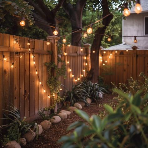 10 inventive fence decorating ideas Patio Fence Decorating Ideas, Wire Fence Decorating Ideas, Fence Decorating Ideas, Hanging String Lights, Simple Geometric Pattern, Old Picture Frames, Bamboo Fence, Fence Decor, Vinyl Fence