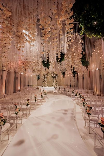 Who wouldn’t want to walk down the aisle underneath a breathtaking ceiling like this? A shower of blush florals transforms this ceremony into a romantic vision. Indoor Wedding Ceremonies, Rustic Wedding Decorations, Wedding Scene, Wedding Ceremony Ideas, Stage Decorations, Wedding Stage, Indoor Wedding, Wedding Ceremony Decorations, Wedding Cake Designs