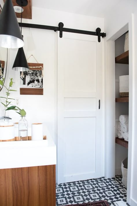 A Small Bathroom Door Is the Designer Trick You've Probably Never Considered, But Should Small Corner Bath, Small Bathroom Door Ideas, Small Bathroom Door, Bathroom Door Ideas, Modern Sliding Barn Door, Diy Sliding Barn Door, Small Doors, Bathroom Door, Small Bath