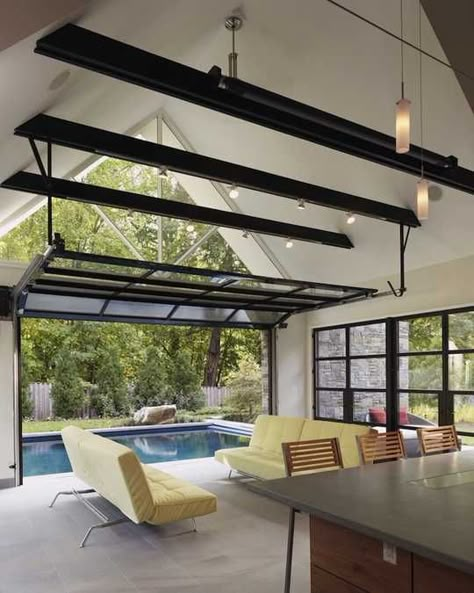 Home indoor outdoor pool | ... pool house design connecting home interiors and outdoor swimming pool Indoor Outdoor Pools, Pool House Design, Glass Garage, Pool House Ideas, Pool House Designs, Glass Garage Door, Home Design Magazines, Indoor Outdoor Pool, Home Addition