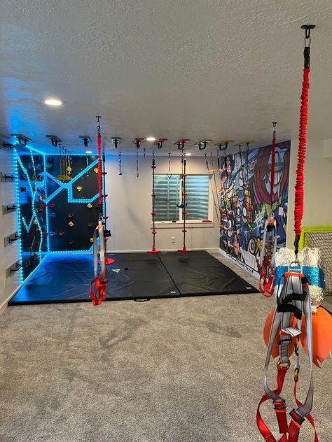 Basement Ninja Gym, Indoor Home Jungle Gym, At Home Jungle Gym, Large Motor Playroom, Bedroom Jungle Gym, Garage Sensory Room, Swings In Basement, Jungle Gym Basement, Diy Indoor Jungle Gym