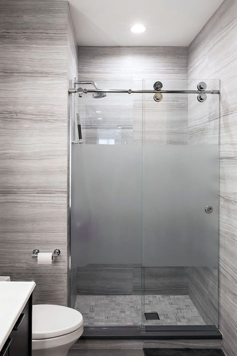 Gray Porcelain Tile Bathroom and Shower with frosted sliding glass doors and modern hardware. Concrete Bathroom Design, Modern Shower Doors, Modern Shower Design, Grey Bathrooms Designs, Shower Sliding Glass Door, Tub To Shower Conversion, Bathroom Shower Doors, Simple Bathroom Designs, Shower Door Hardware