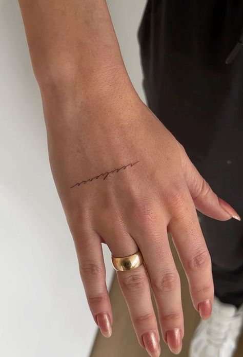 Hand Poke Back Tattoo Small Hand Word Tattoos, Words On Hands Tattoo, Cursive Line Tattoo, Hand Letter Tattoos For Women, Small Delicate Hand Tattoos For Women, Hand Tattoo Placement Words, Word On Back Tattoo, Hand Tattoos For Women Fine Line, Hand Tiny Tattoo