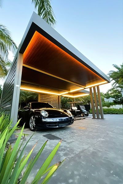 The R-Car carport is the perfect solution for residents looking to protect their vehicles from the heat, rain or snow. Small Car Porch Design, Driveway Car Cover Ideas, Modern Parking Design, Hidden House Features, Parking Roof Design, Car Shades Parking Ideas, Canopy Carport Design, Car Porch Ideas, Car Porch Design Modern